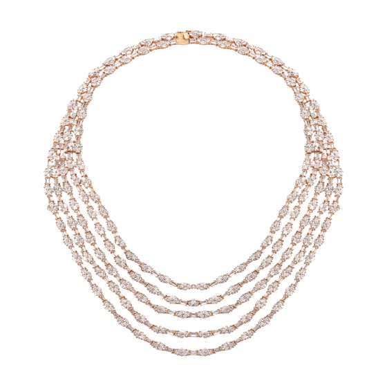A large set of five lines, gold plated and studded with zircon stones