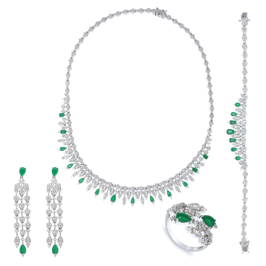 big set, plated in gold, studded with zircon stones