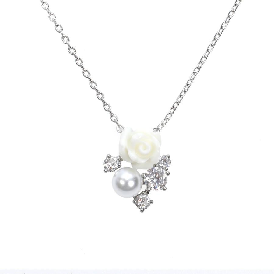 Small gold plated set with rose shape and zircon stones