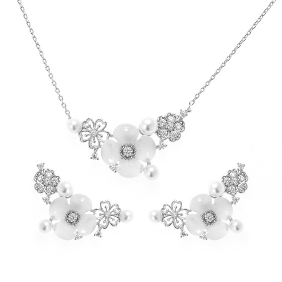 Small  set delicate plated with gold ,studded with zircon stones with white pearls