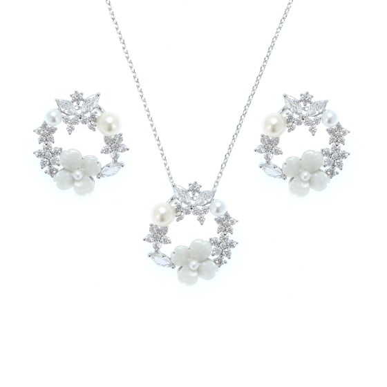A small set delicate set of gold-plated,studded with colored cubic zirconia and white pearls.