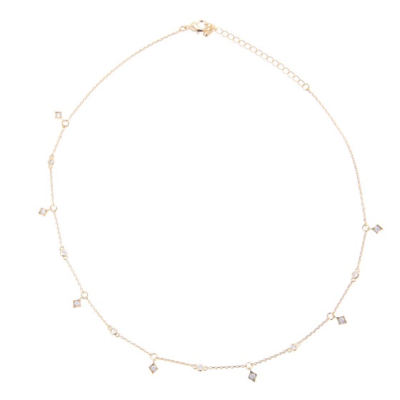 A gold-plated ornate necklace studded with zircon stones